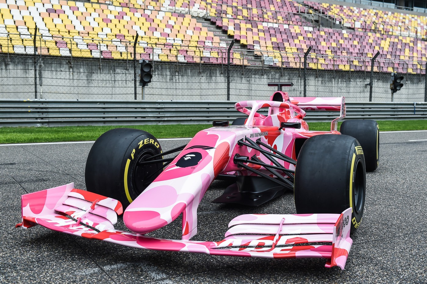 https___hk.hypebeast.com_files_2019_04_bape-formula-1-f1-car-pink-abc-camo-shanghai-3.jpg
