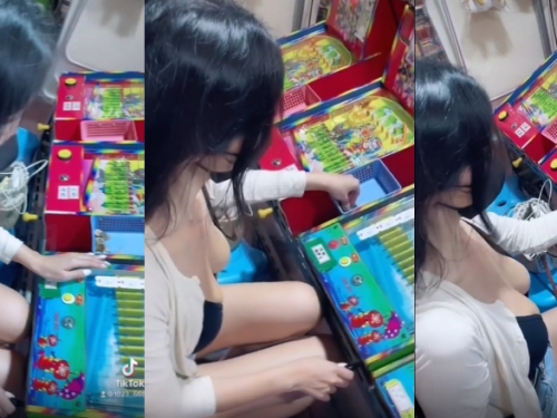 夜市遊戲攤驚見口罩妹「爆乳打彈珠」　胸前自備兩顆渾圓大珠子應戰