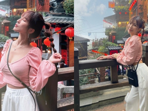 九份老街出現「粉衣美乳妹」，窈窕小蠻腰太吸睛，好想請她喝杯茶～