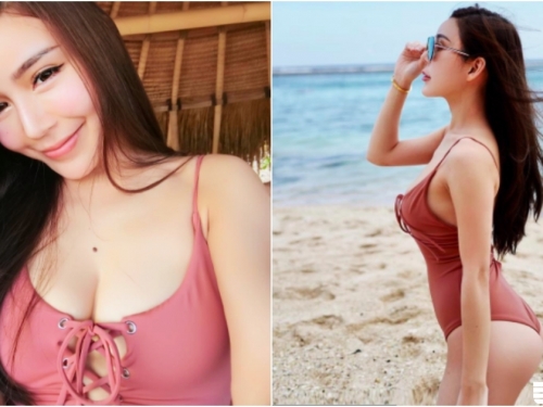 胸懷大志！「長髮大奶妹」海灘度假！綁帶泳衣也包不住「肉肉雙峰」啊！