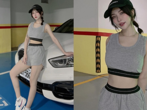 香車配美人！「白皙正妹」倚靠車頭太吸睛，「大眼甜笑」讓司機戀愛