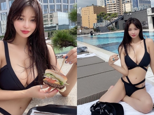 好誘人！火辣美乳姐姐「泳池爆乳吃漢堡」，兩顆車頭燈比食物還大了！