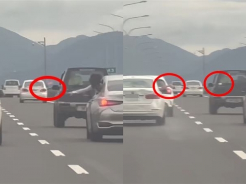 荒謬畫面曝！國道兩車上演「水球大戰」　雙方互砸全都錄