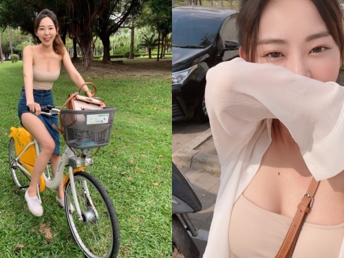 這樣騎Ubike合理嗎！氣質正妹「低胸小背心＋高衩長裙」騎車，美乳美腿回頭率100%！