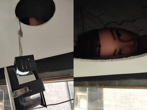 水電師傅裝修燈具 天花板內驚見「一顆頭」 他近看傻眼了