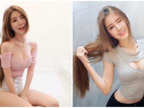 白皙「巨乳老闆娘」用胸部送愛心！中空上衣露出渾圓爆乳，用甜美笑容買下你的心！