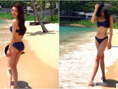 海邊「比基尼正妹」回眸一笑！修長美腿＋「細腰翹臀」好想跟她一起玩水啊！