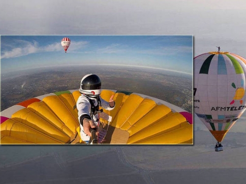 法國人站「熱氣球頂」 升空3637公尺破世界紀錄