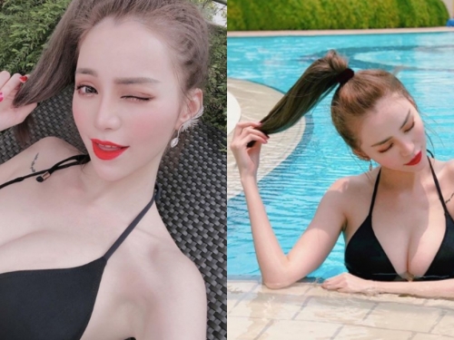超辣台灣正妹「Ariel Shih」前進星國玩耍，洶湧海波連魚尾獅都要投降啦